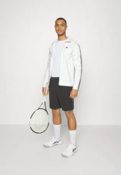 Lacoste Sport Tennis Jacket Med - Trainingsvest - Blanc Jaune -Modekleding Winkel bc33852f7fc8451080b20b9d6a0dd82e